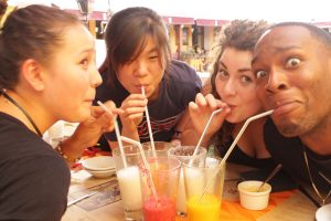 Erica, Amber, Sarah, and Myles enjoying their various fruit juices. Some are enjoying the juice more than others…