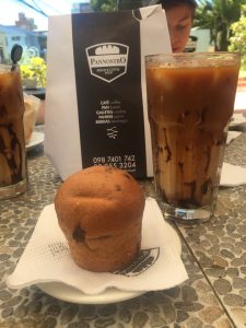 The muffin and iced coffee I ordered at Pannostro. Amy, sitting across from me, ordered a coffee and a cookie, which came with another mini cookie!